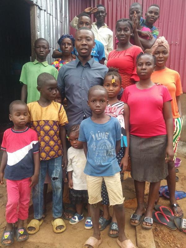 Matthew Kamara with the orphan group in Sierra Leone.